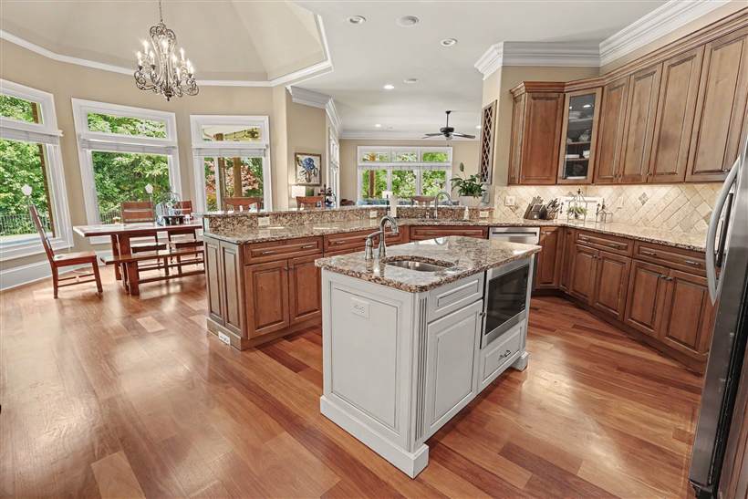 Kitchen with granite and chandelier
