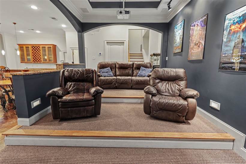Private theatre room with tiered seating